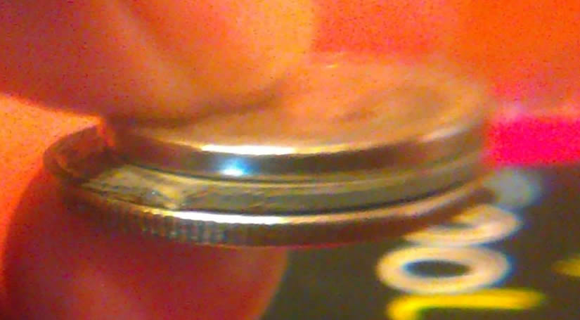 Nickel-Stuck-On-Quarter?